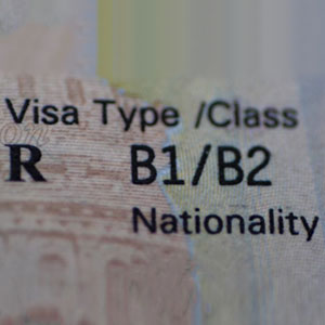 A visa document indicating B1/B2 visa type for a person of a specific nationality. - The Emory Law Firm